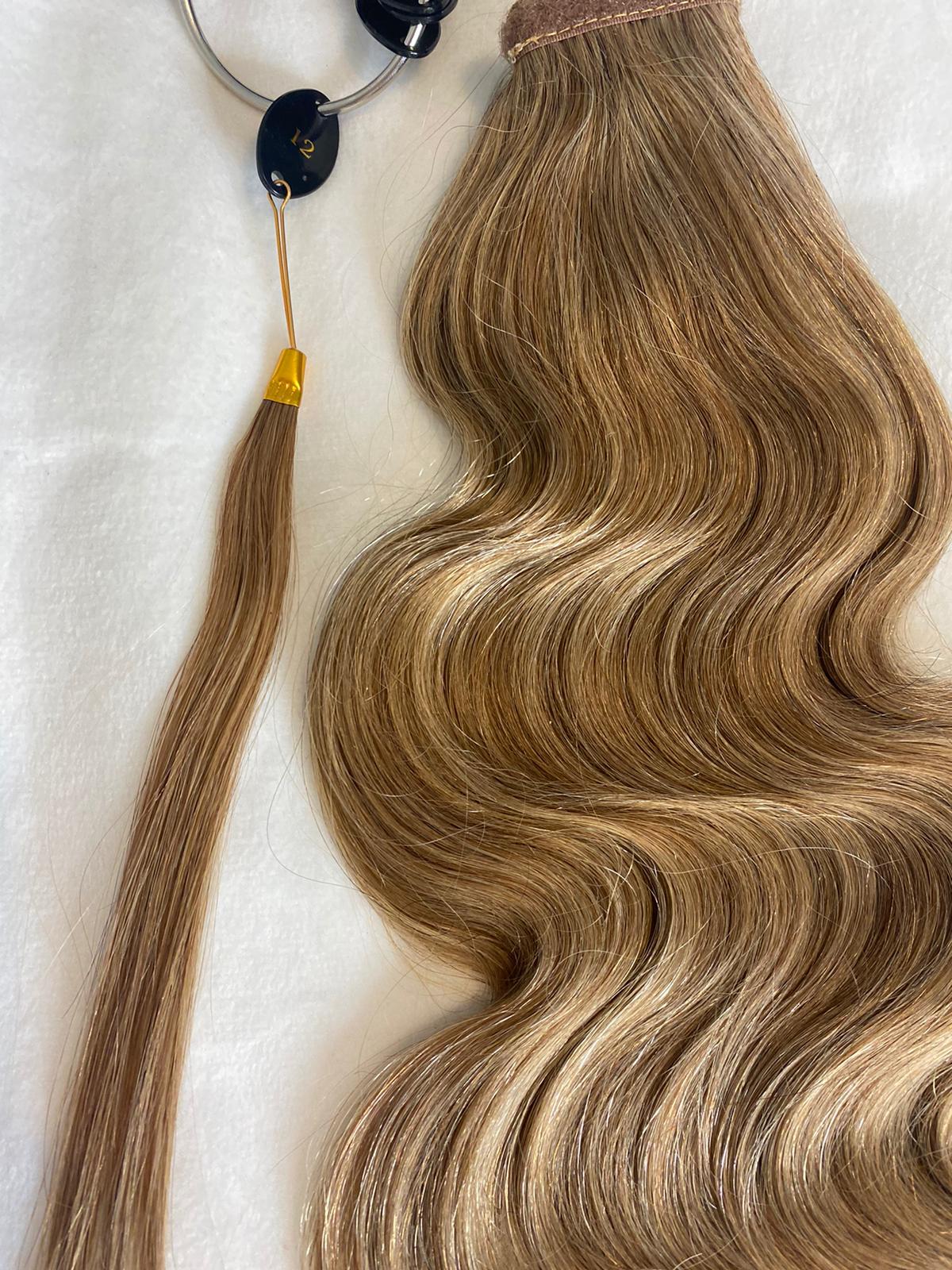 cola hecha de cabello humano, con gancho y banda ajustable para mayor facilidad de poner.