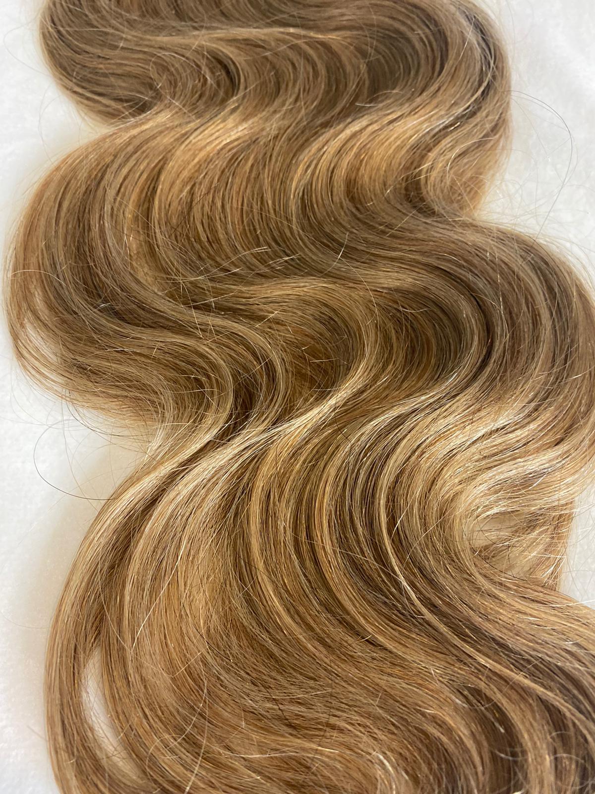 cola hecha de cabello humano, con gancho y banda ajustable para mayor facilidad de poner.
